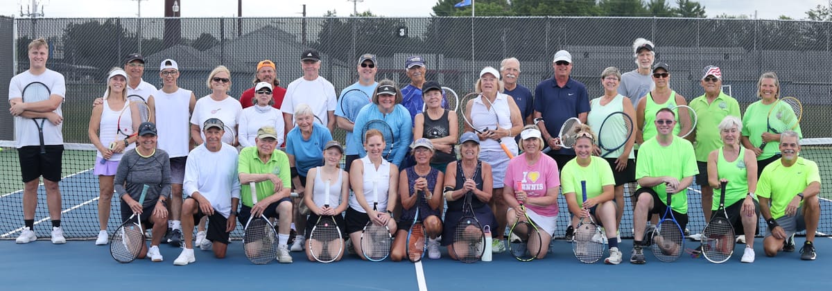 Team Tennis Match Goes On Despite Rain