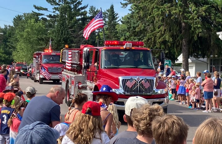Three Lakes Parade Draws Big Crowds for 9 a.m. Start